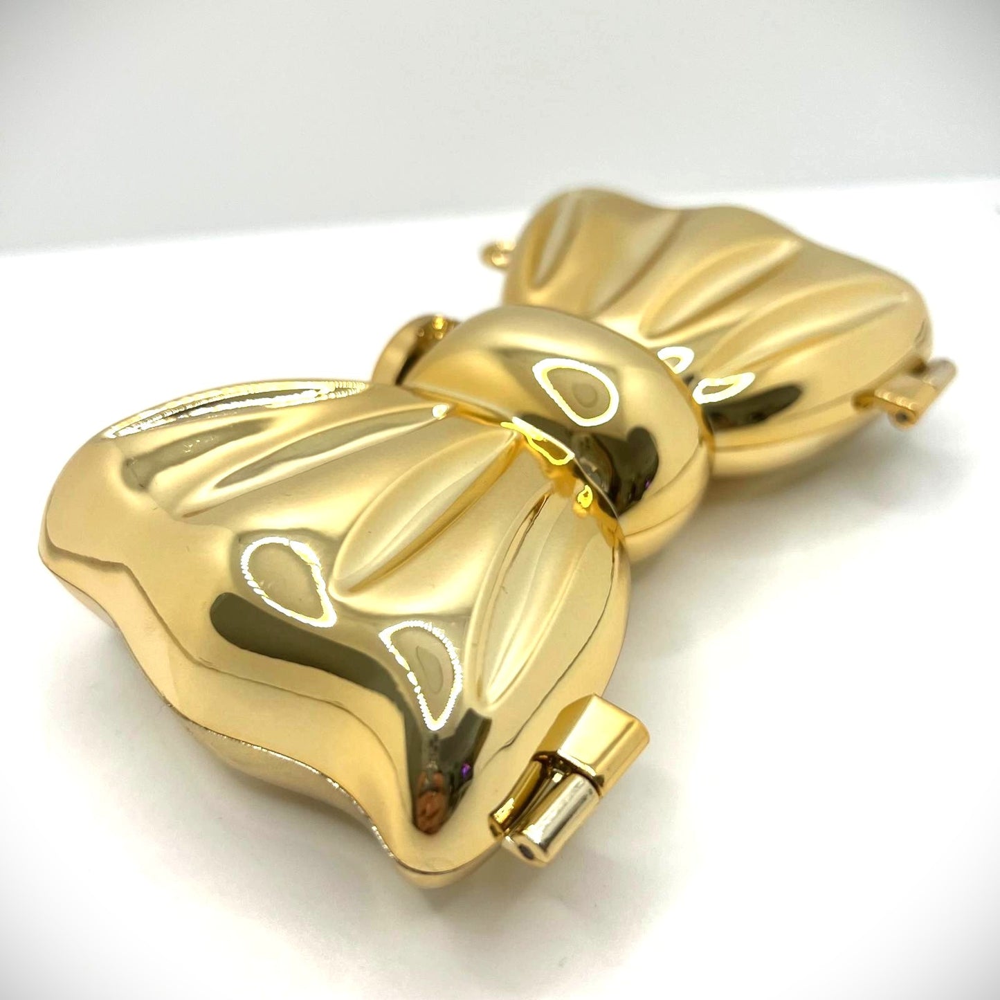 Goldene Mini-Clutch