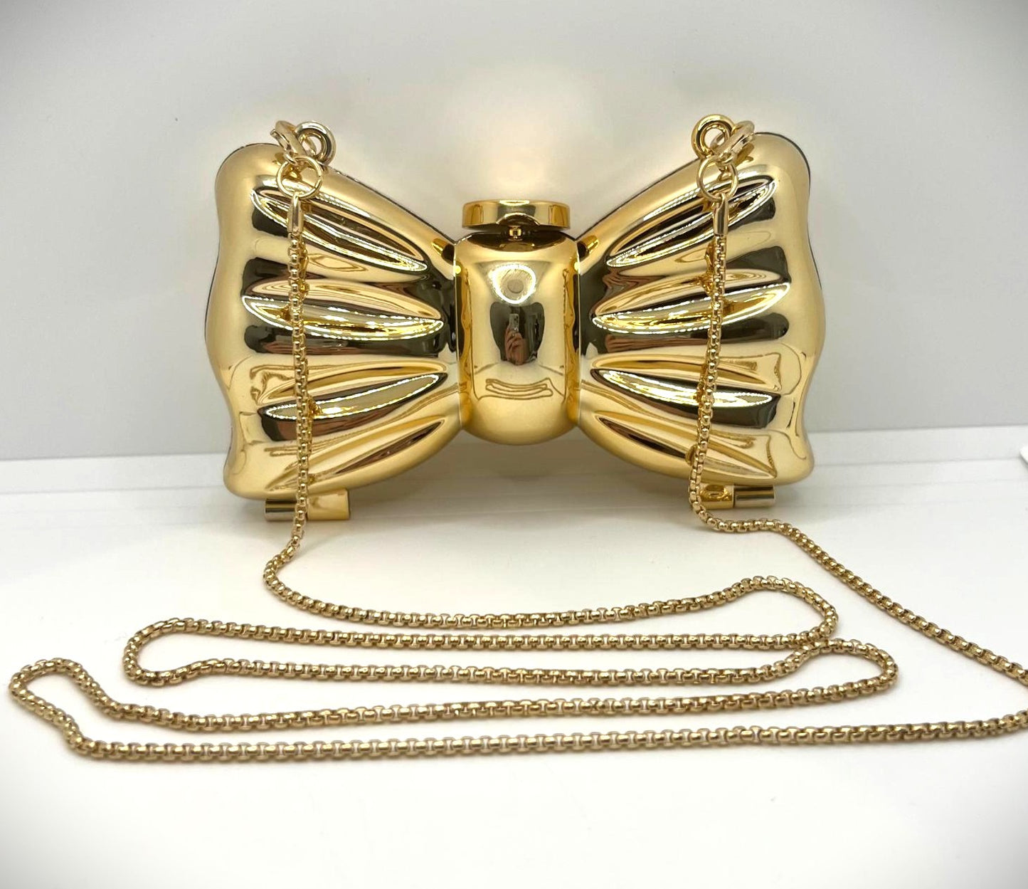 Goldene Mini-Clutch