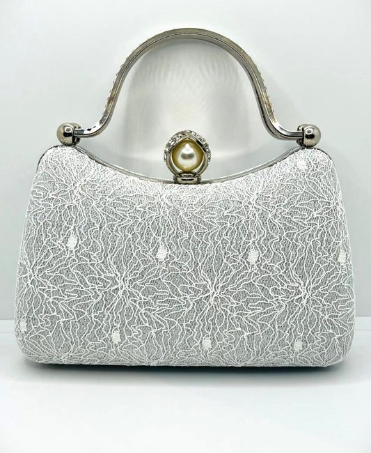 Clutch aus Spitze in Weiß und Silber