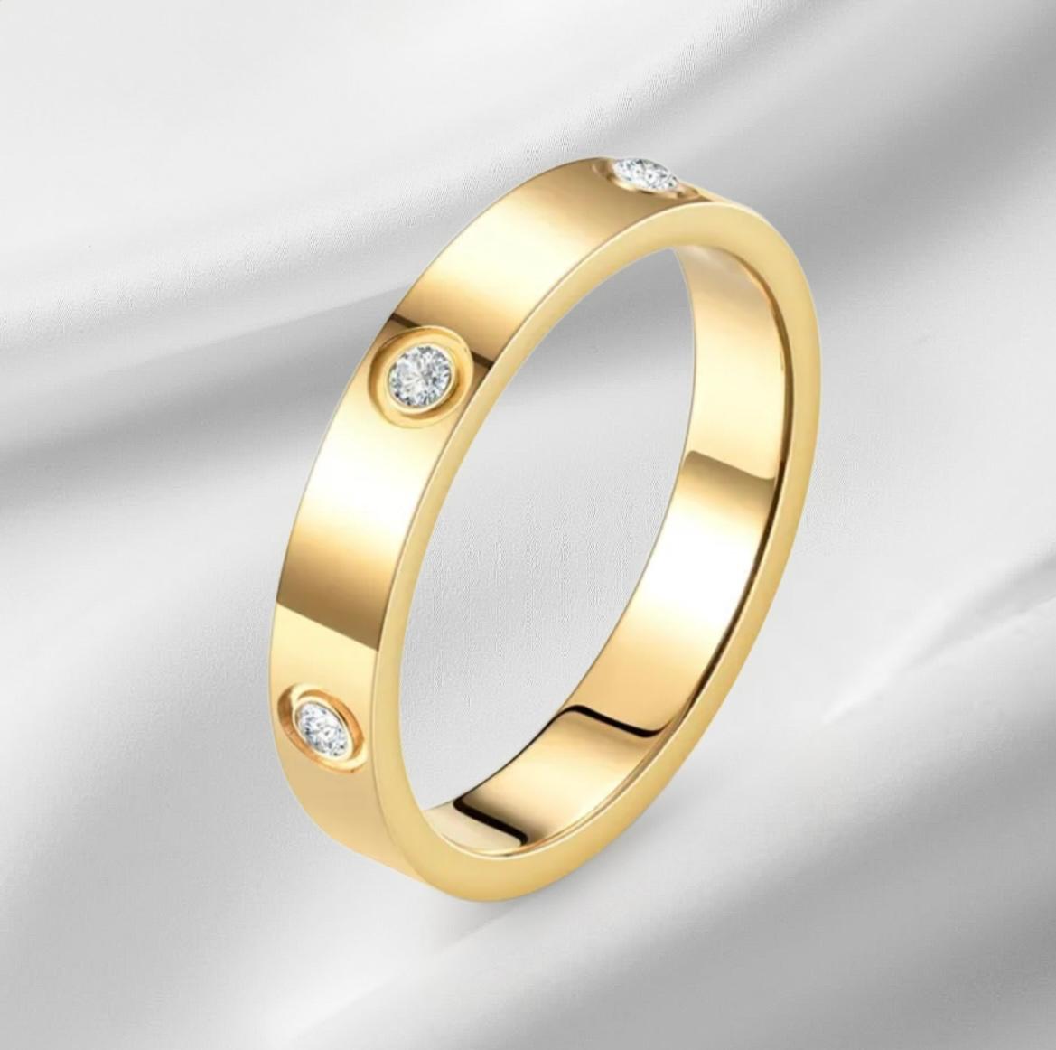 Geometrischer Edelstahlring mit Zirkonia in Gold