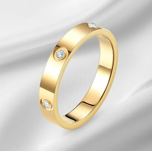 Geometrischer Edelstahlring mit Zirkonia in Gold